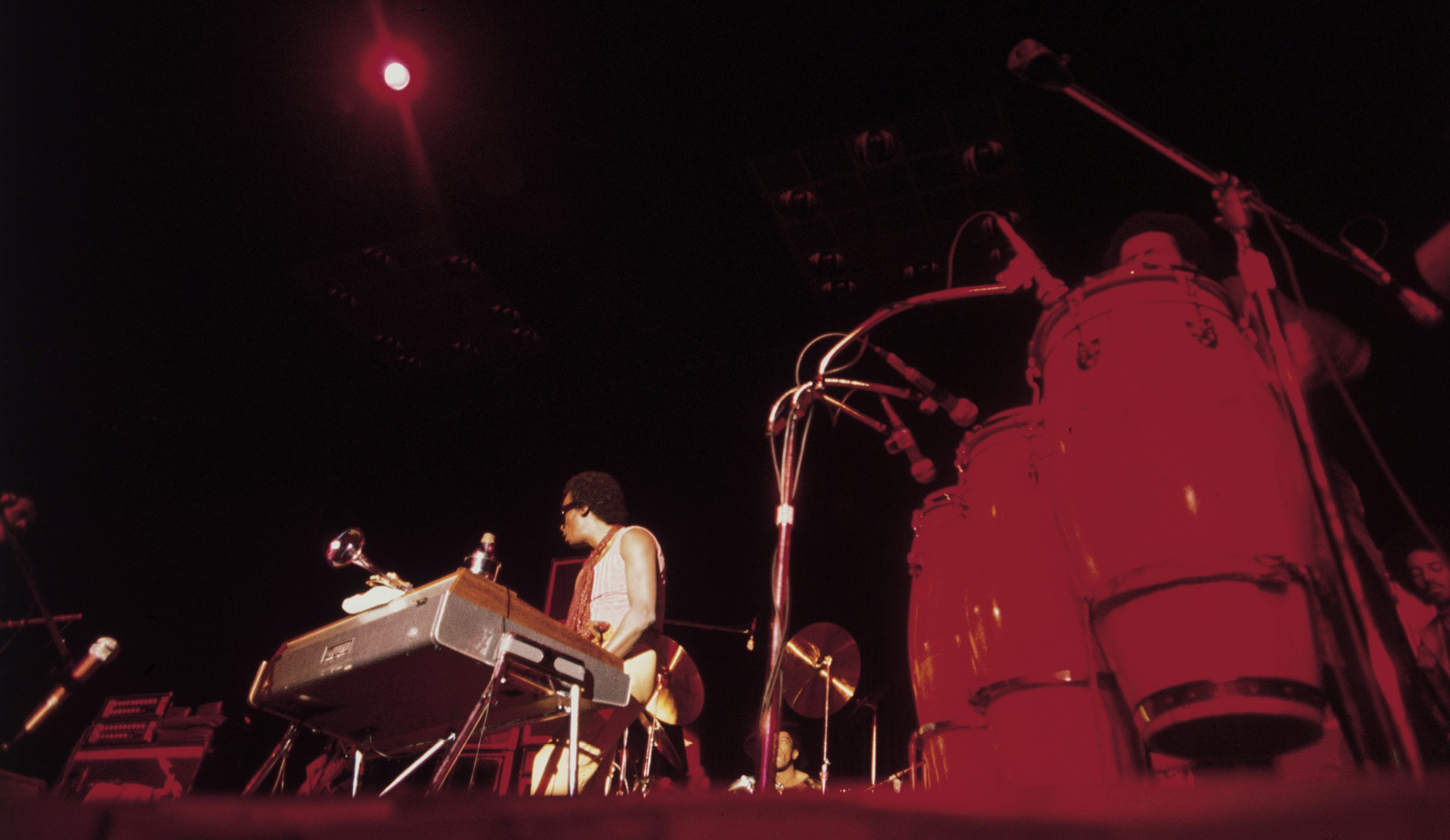 Miles at the keyboard, Mtume on congas, circa 1973. Photo by Urve Kuusik. Courtesy of Sony BMG Music Entertainment.